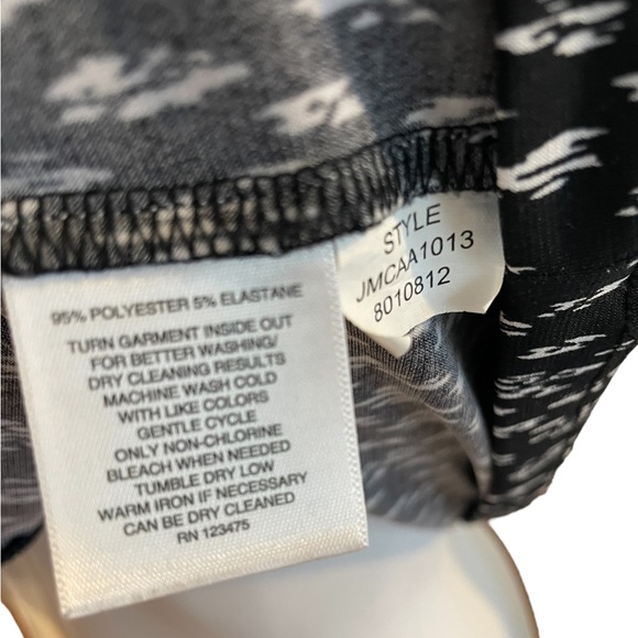 Jones New York Signature Black & White tank with brass/gold accessory in front. - Picture 7 of 8